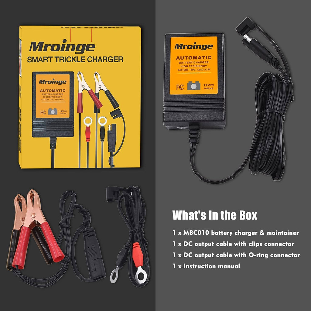 Smart trickle charger kit with charger unit, alligator clamps, DC cables, and extension cord.