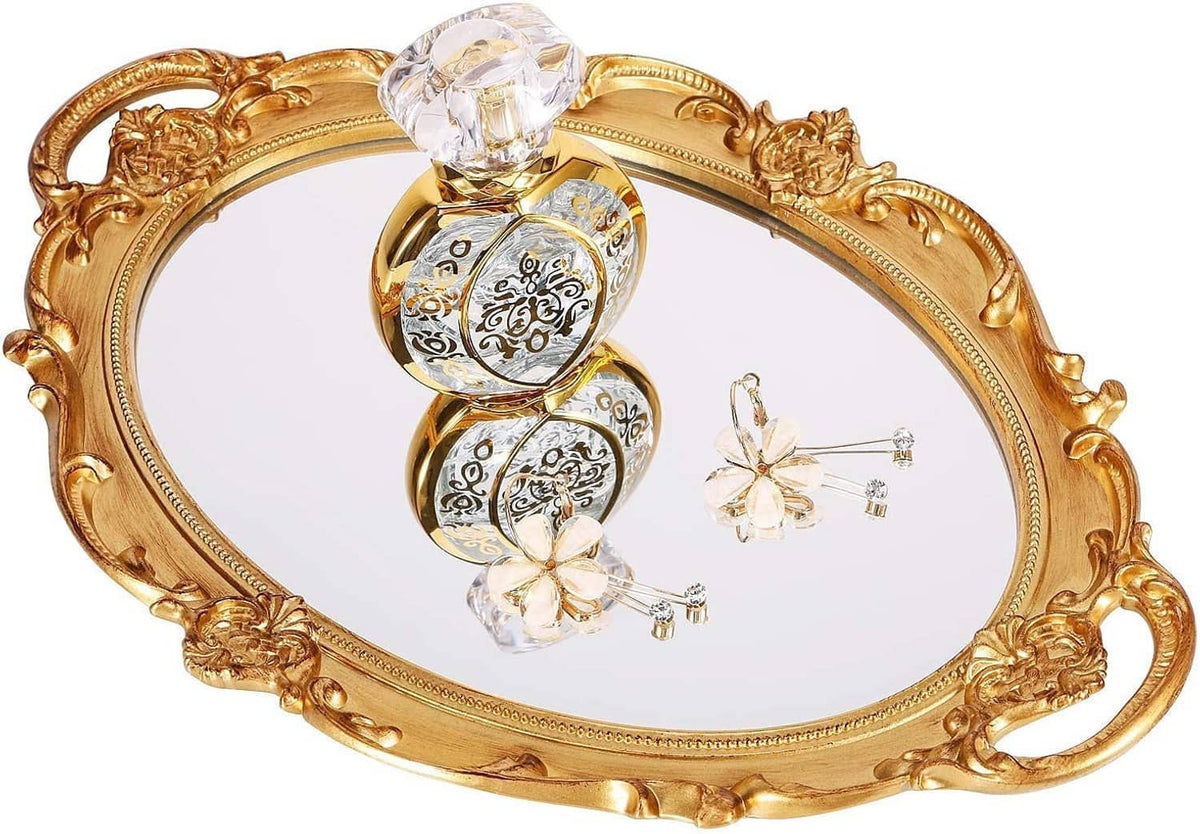 Antique-style gold oval decorative tray with clear crystal centerpiece and floral accents