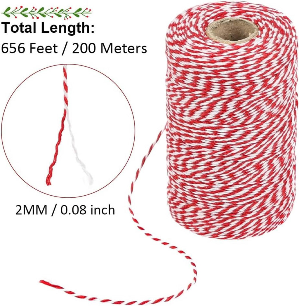 Red and white cotton twine spool with thin twisted strands and loose length