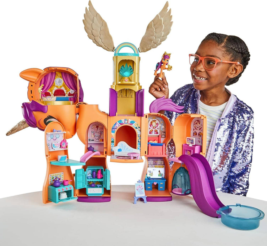 Transforming purple and orange My Little Pony playset with winged doll and accessories
