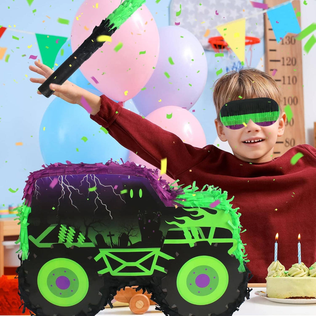 Green and purple monster truck pinata with stick and blindfold