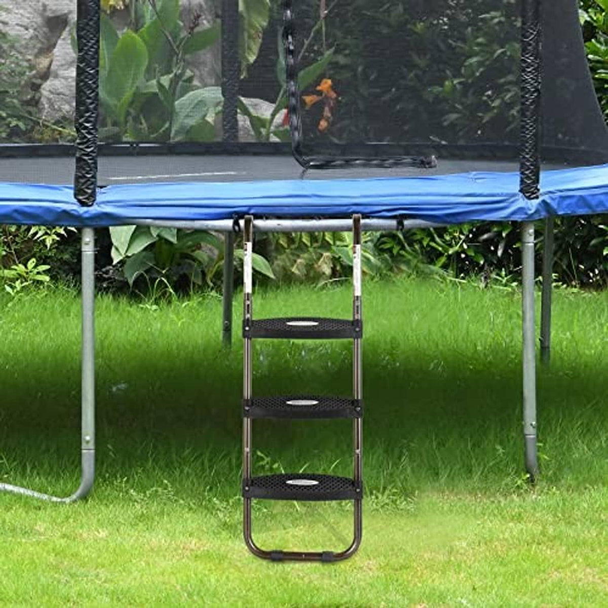 Outdoor trampoline ladder with three dark wide steps and curved safety frame