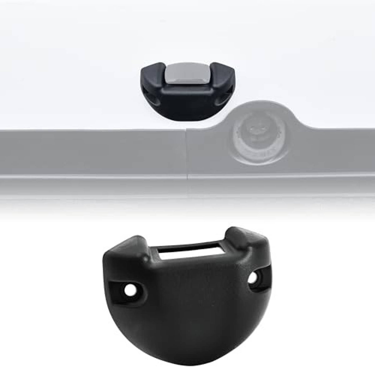 Black switch housing base cover mounted on a light gray panel edge