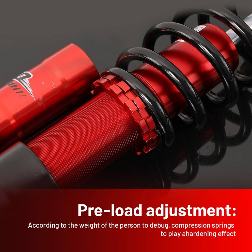 Close-up of red shock body and black coil spring with adjustment hardware