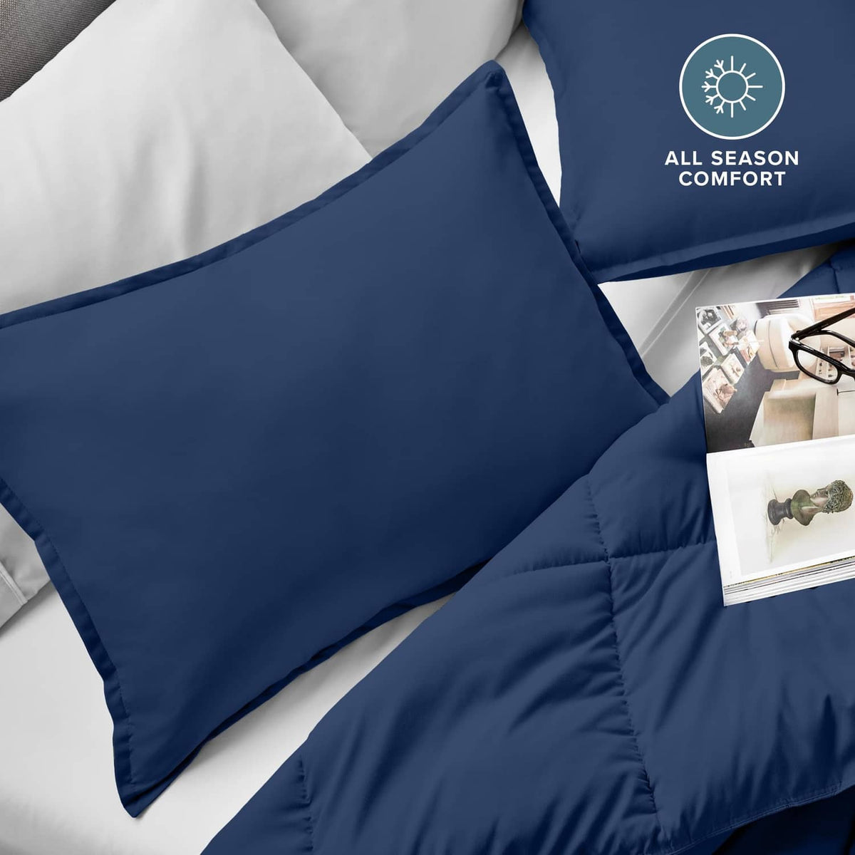 Dark blue king pillow sham pair with envelope flap, angled view