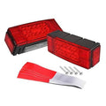Red low-profile rectangular LED trailer light with black housing, waterproof design