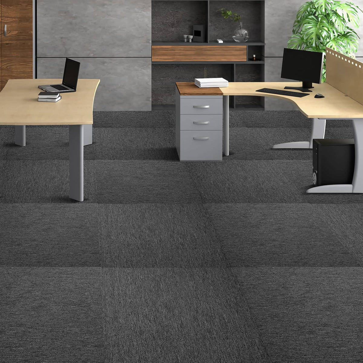 Dark gray carpet tile flooring covering an office workspace area