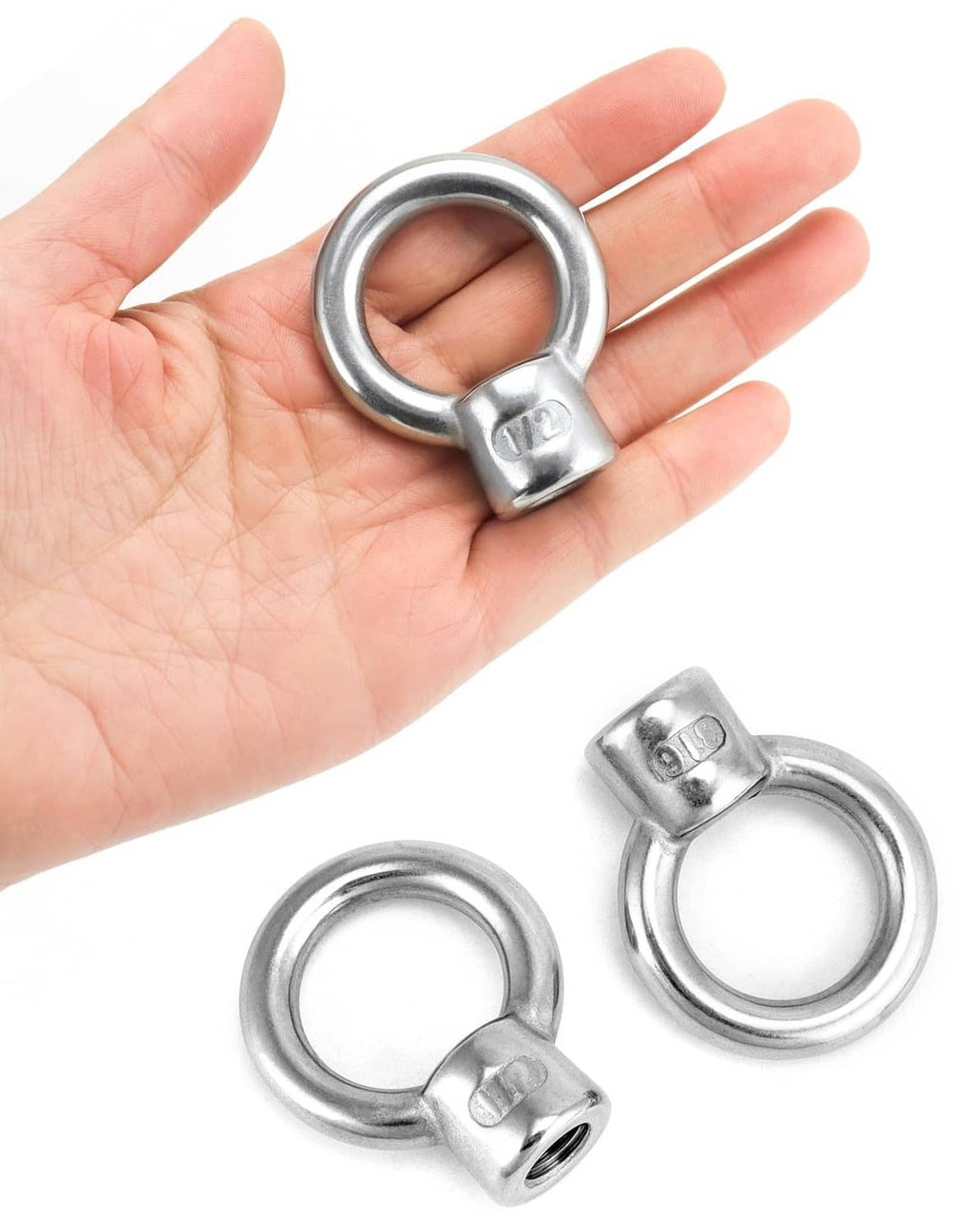 Stainless lifting eye nut on hand, 1/2 in UNC thread, includes two eye nuts