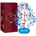Turquoise crystal tree ornament with blue stone base, shown with retail box