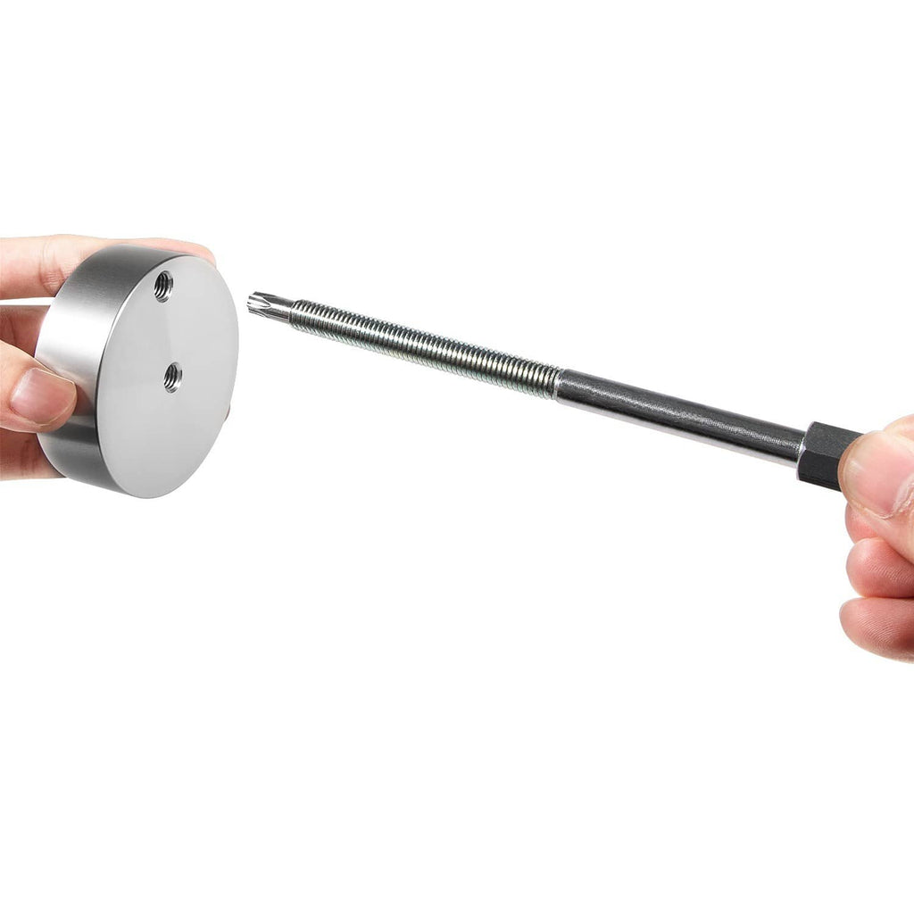 Hands holding clutch belt removal tool pulley and long threaded rod for tightening