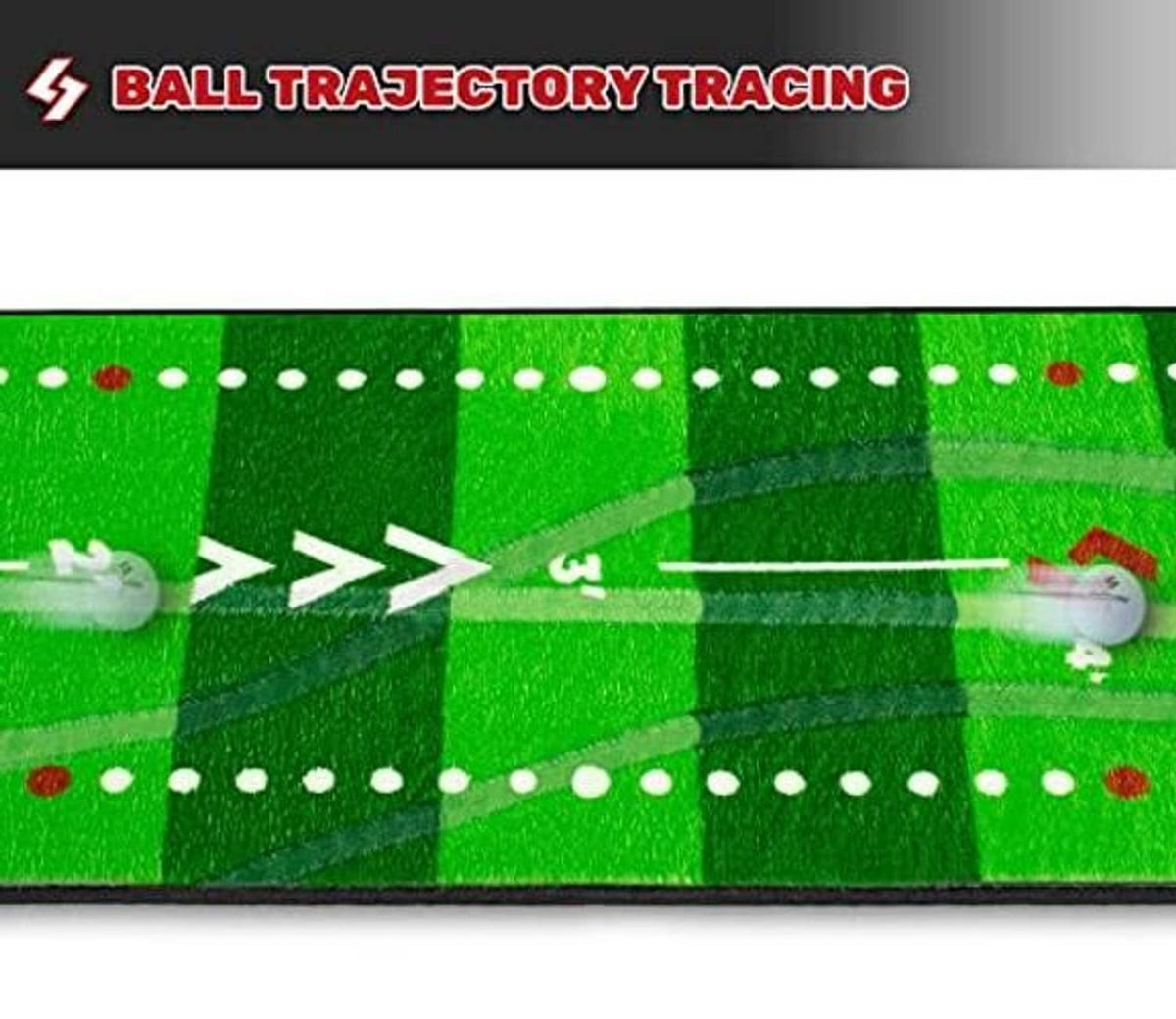 Close-up of green putting mat with dotted trajectory path and aiming arrows