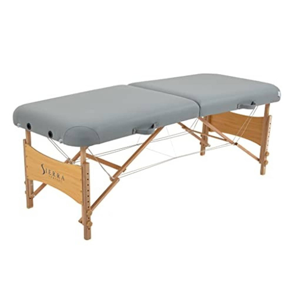 Gray massage table with padded top, rounded leg frame, and support wires