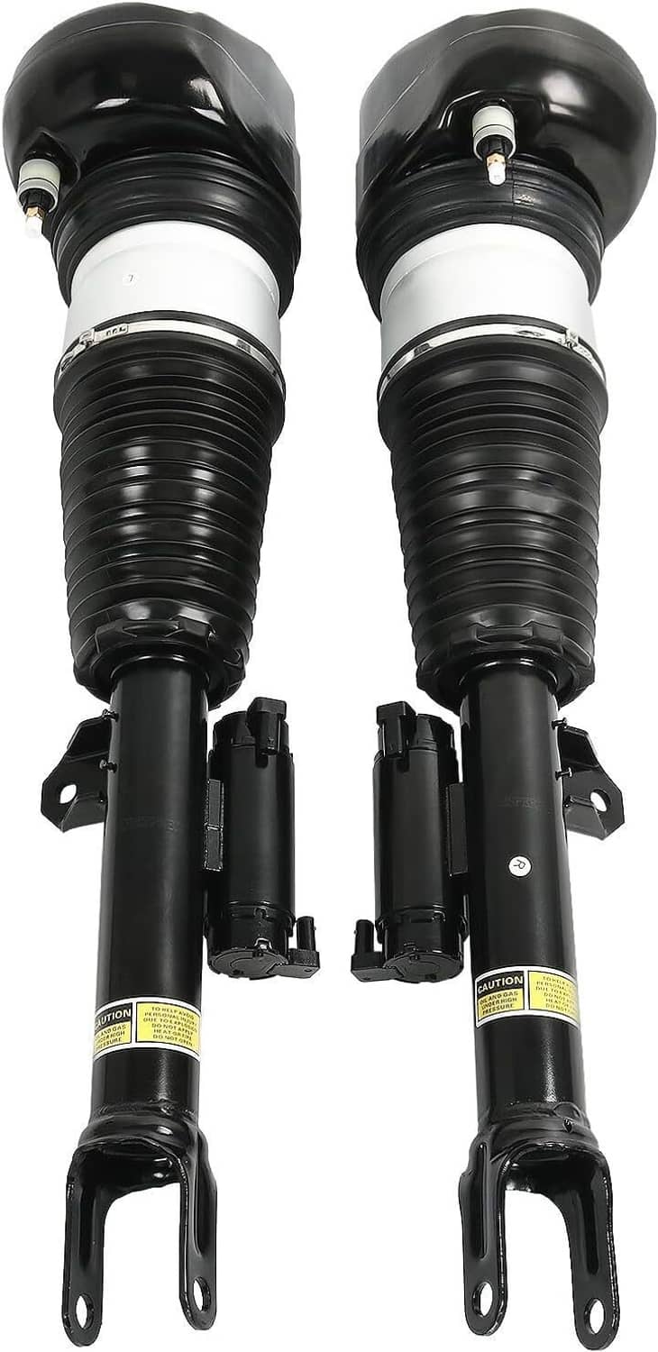 Front pair of black air suspension shock struts with white air sleeve bands and mounting eyes