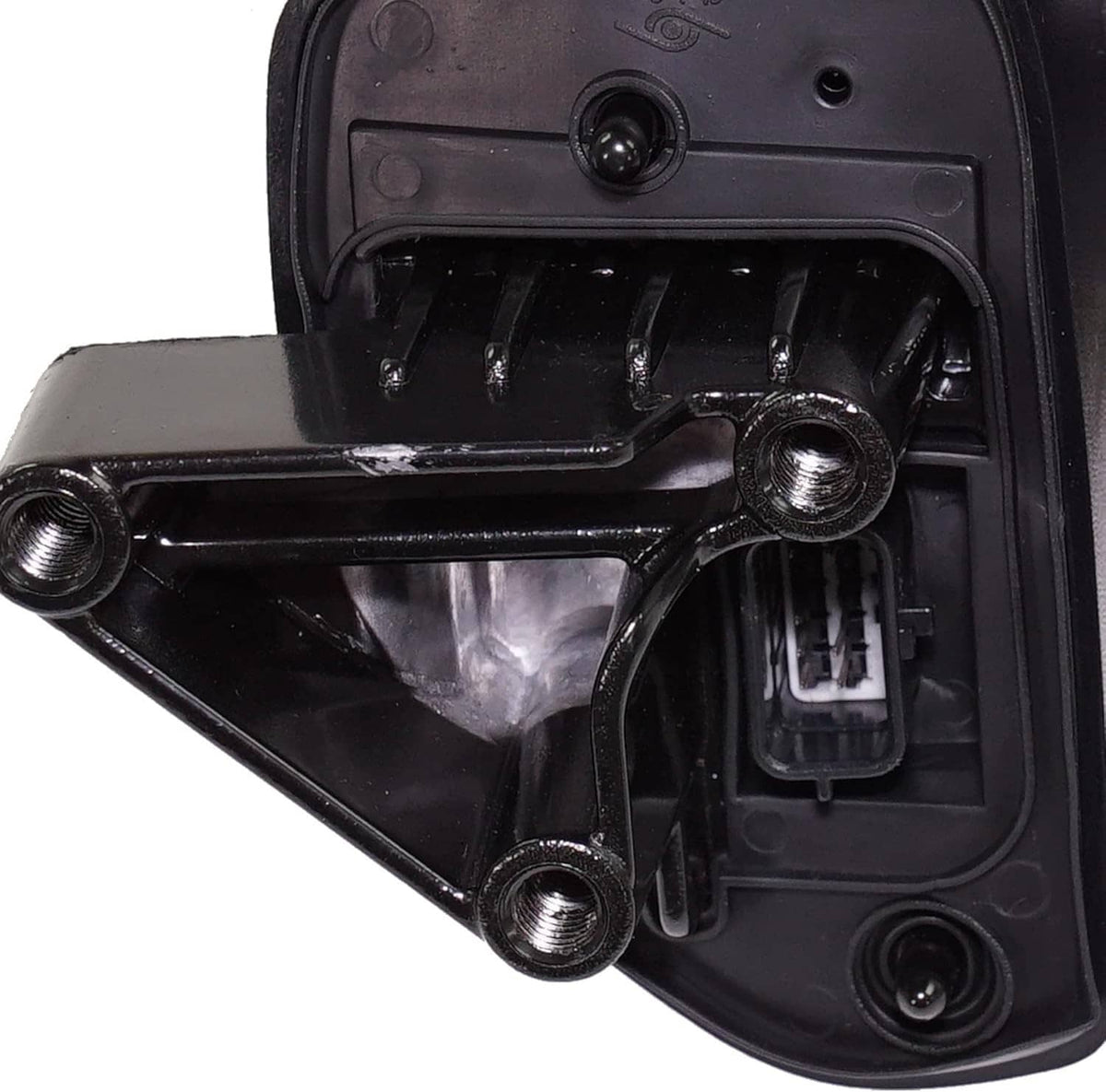 Close-up of blind spot mirror mounting bracket and internal wiring components