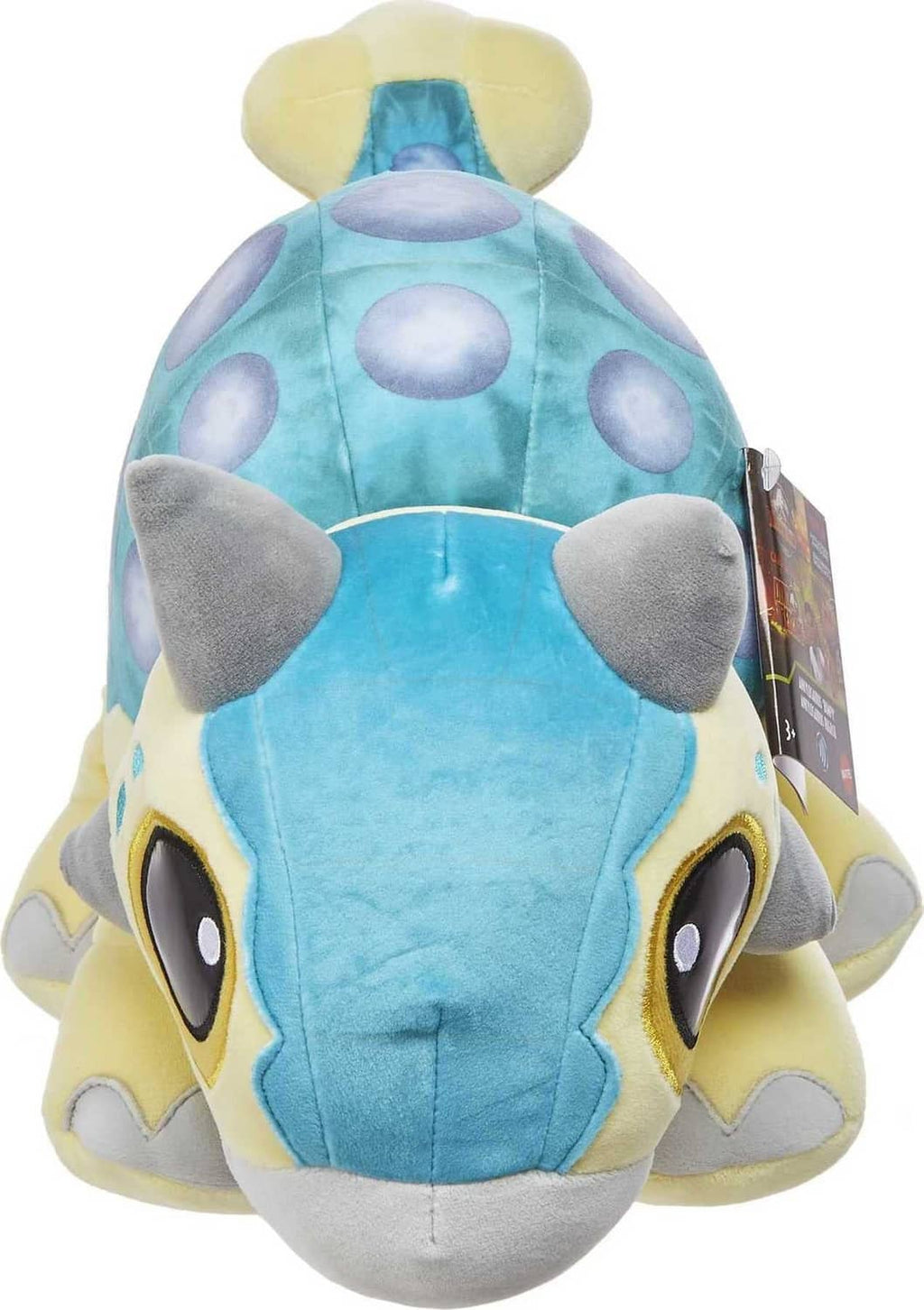 Blue plush baby dinosaur back view with purple spots and rounded gray ear bumps