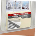Beige window air conditioner cover with silver mesh insert, installed on window sill