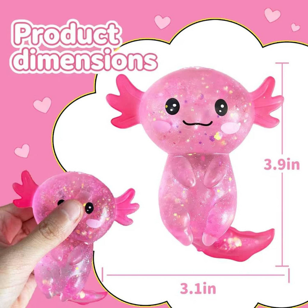 Pink glitter axolotl squish toy, held by hand; cute smiling face and fins