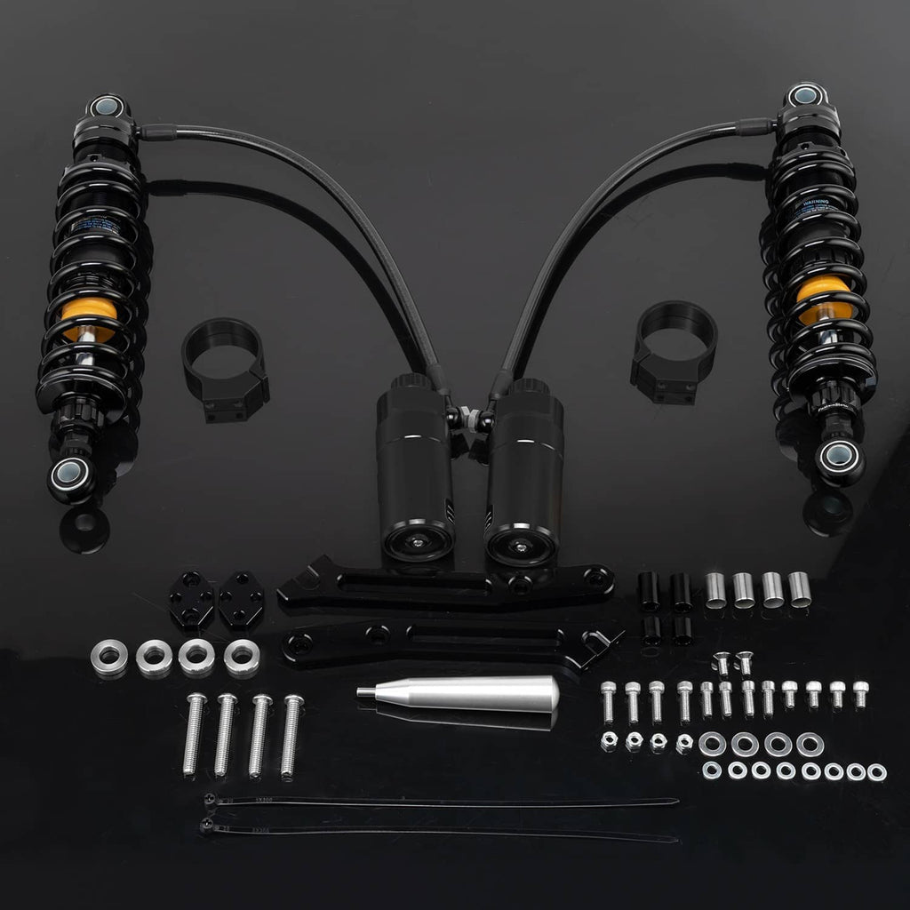 Black remote reservoir suspension shocks set with yellow adjuster rings and mounting hardware