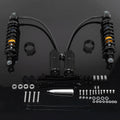 Black remote reservoir suspension shocks set with yellow adjuster rings and mounting hardware