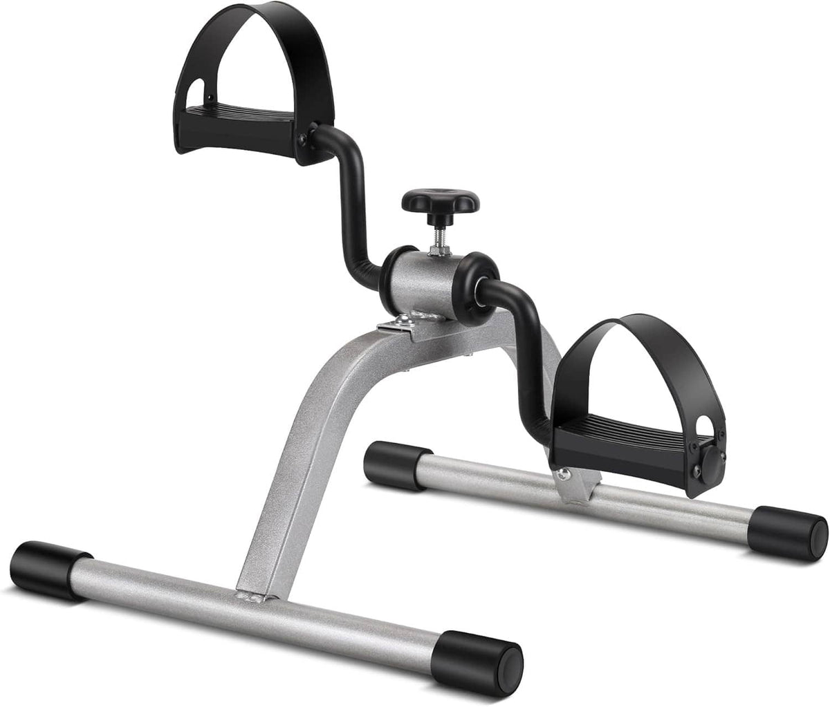 Mini exercise pedal bike with silver frame, black handles, and adjustable seat for arms/legs