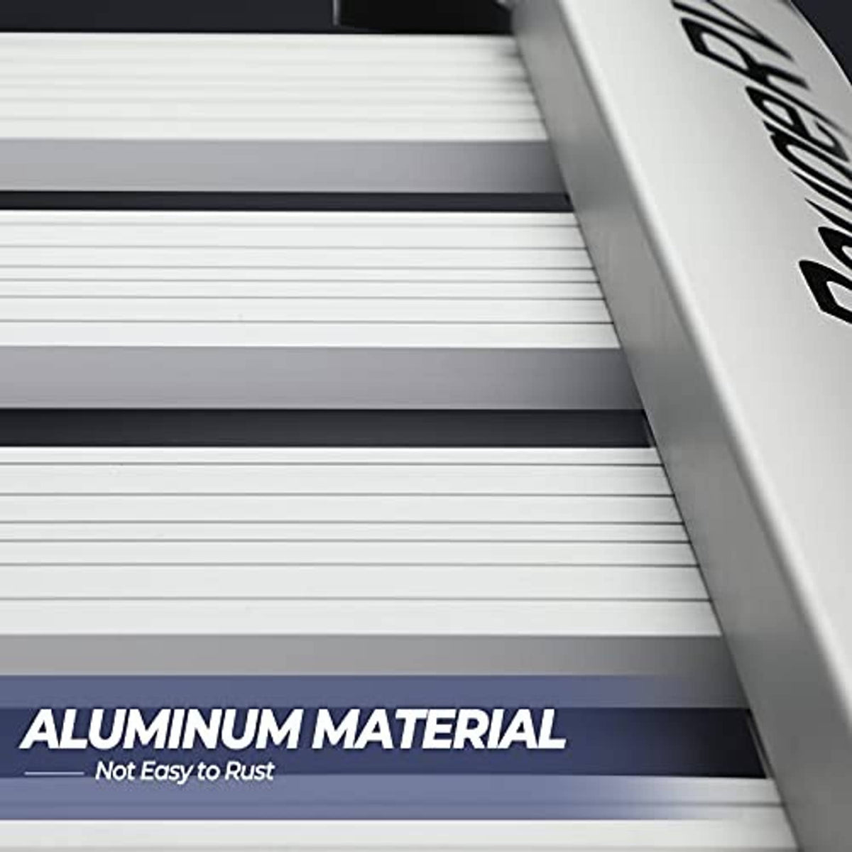 Close-up of aluminum slatted rooftop cargo basket deck with black end trim