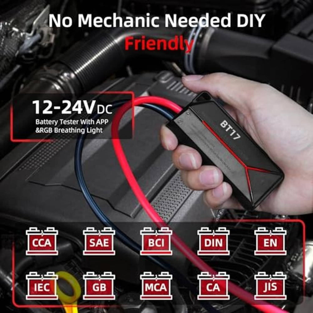 Hand holding a BT17 battery tester with red/black cable leads on an engine bay