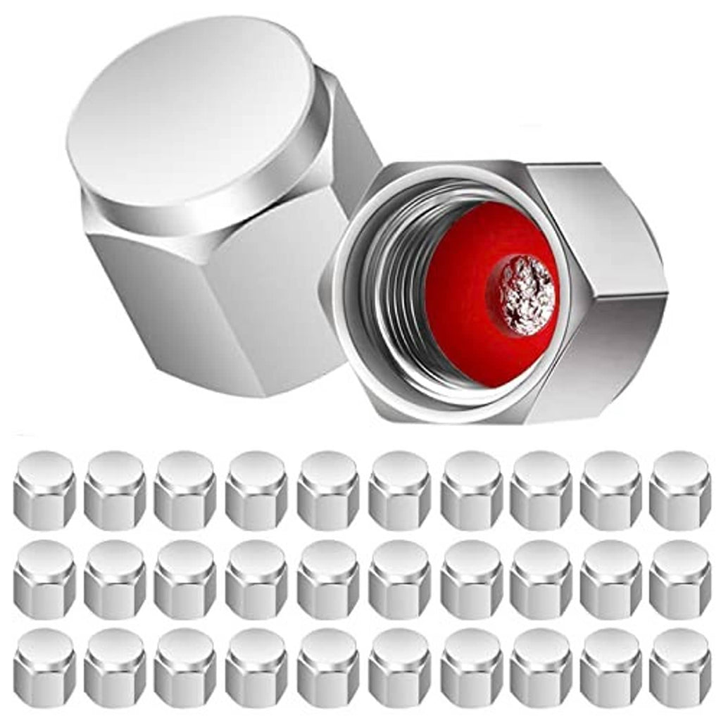 Chrome tire valve stem caps, open cap reveals red insert and valve threads