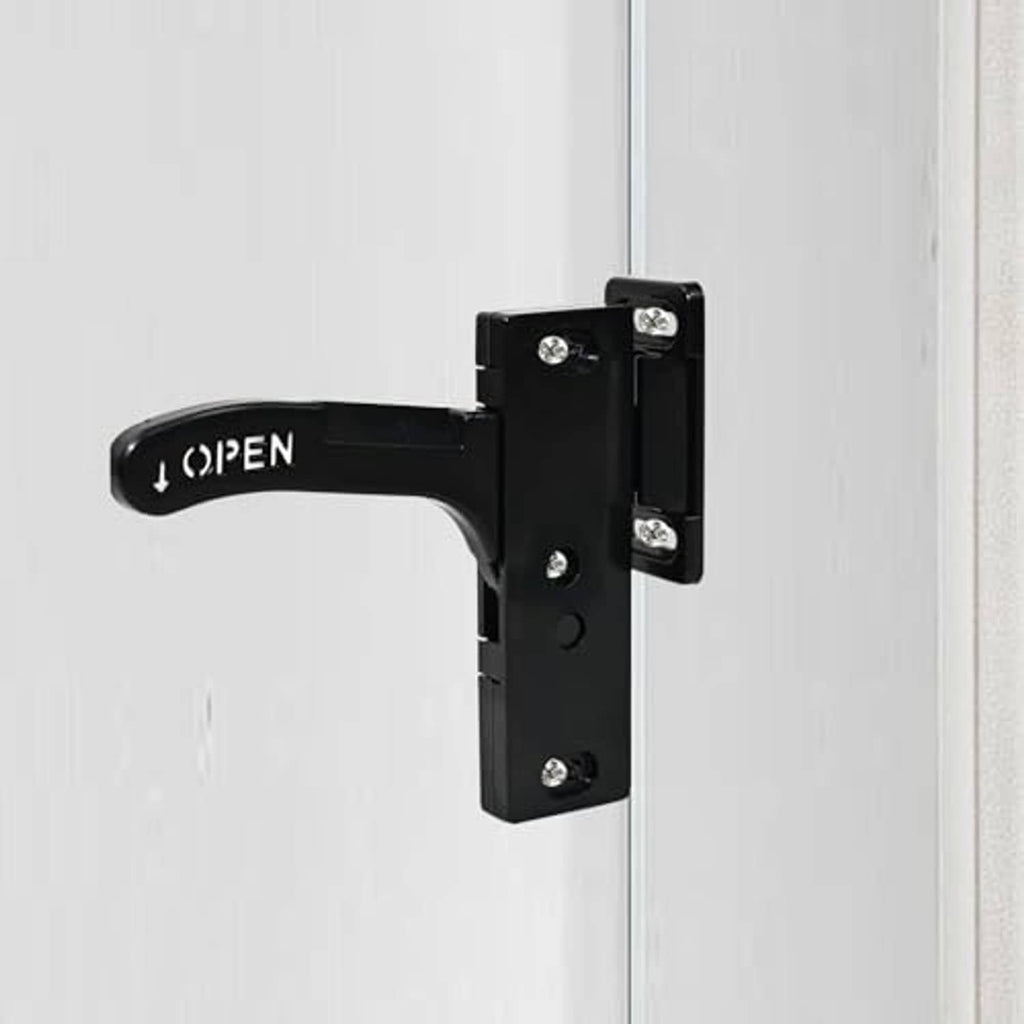 Black RV screen door latch handle replacement attached to a door frame