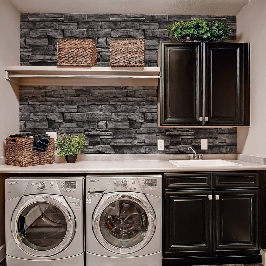 Dark gray brick-pattern wallpaper on a kitchen backsplash behind cabinets.