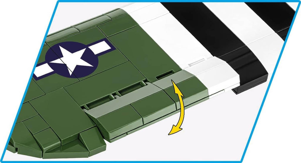Close-up of green WACO CG-4 wing with star emblem and black-and-white stripe panels