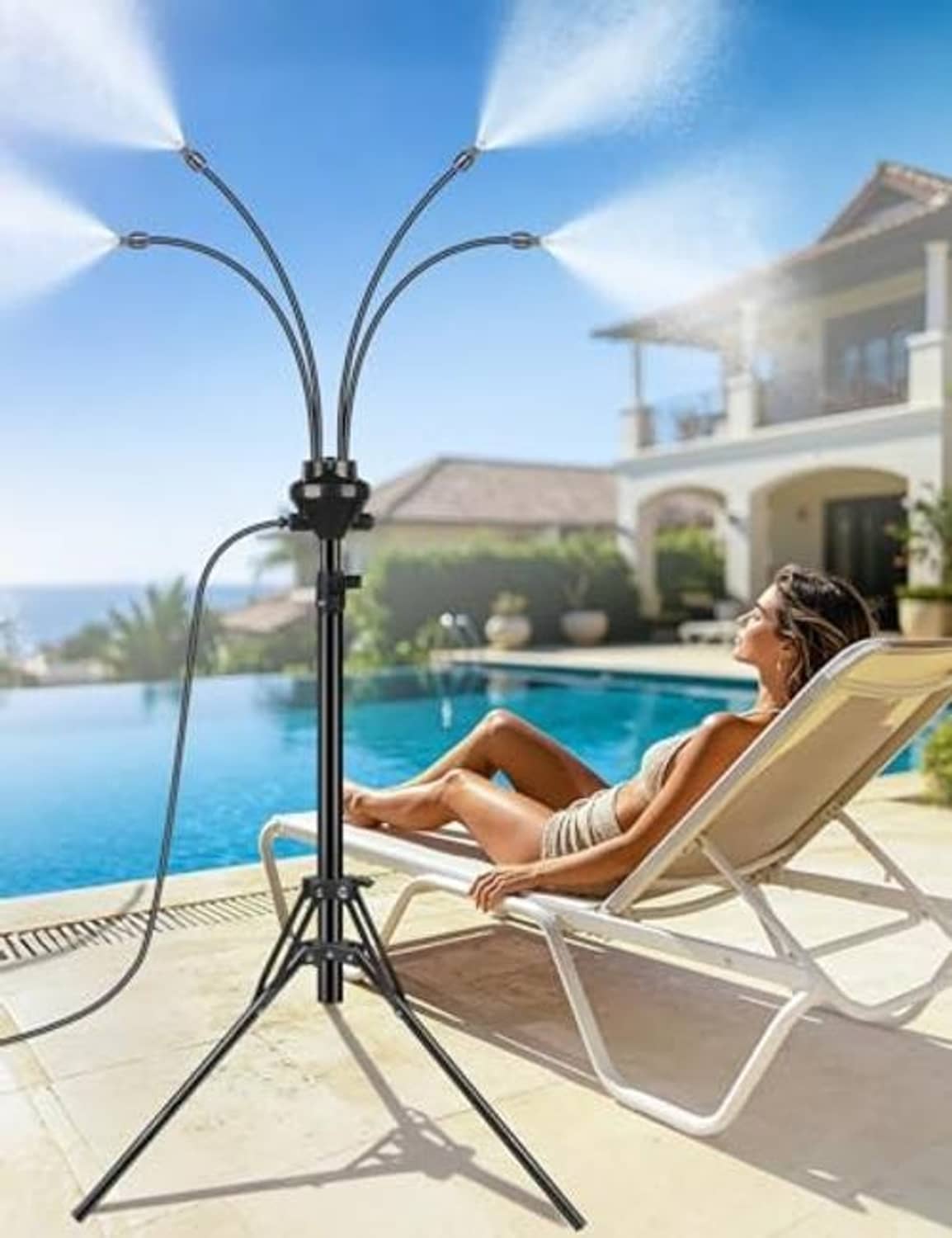 Black standing patio misting system with angled spray nozzles and tripod legs