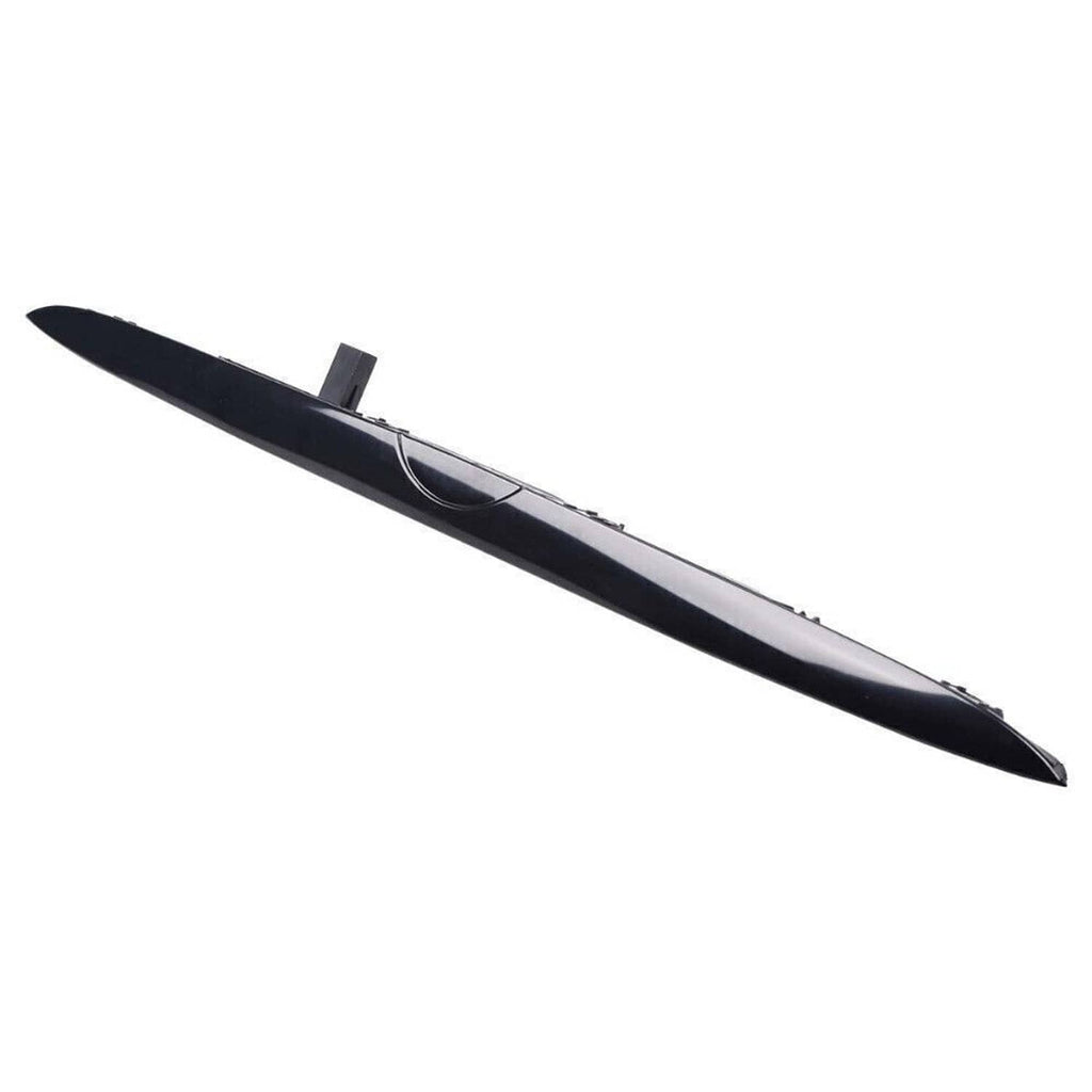 Black tailgate grip handle trim bar angled view with curved end and light lens detail