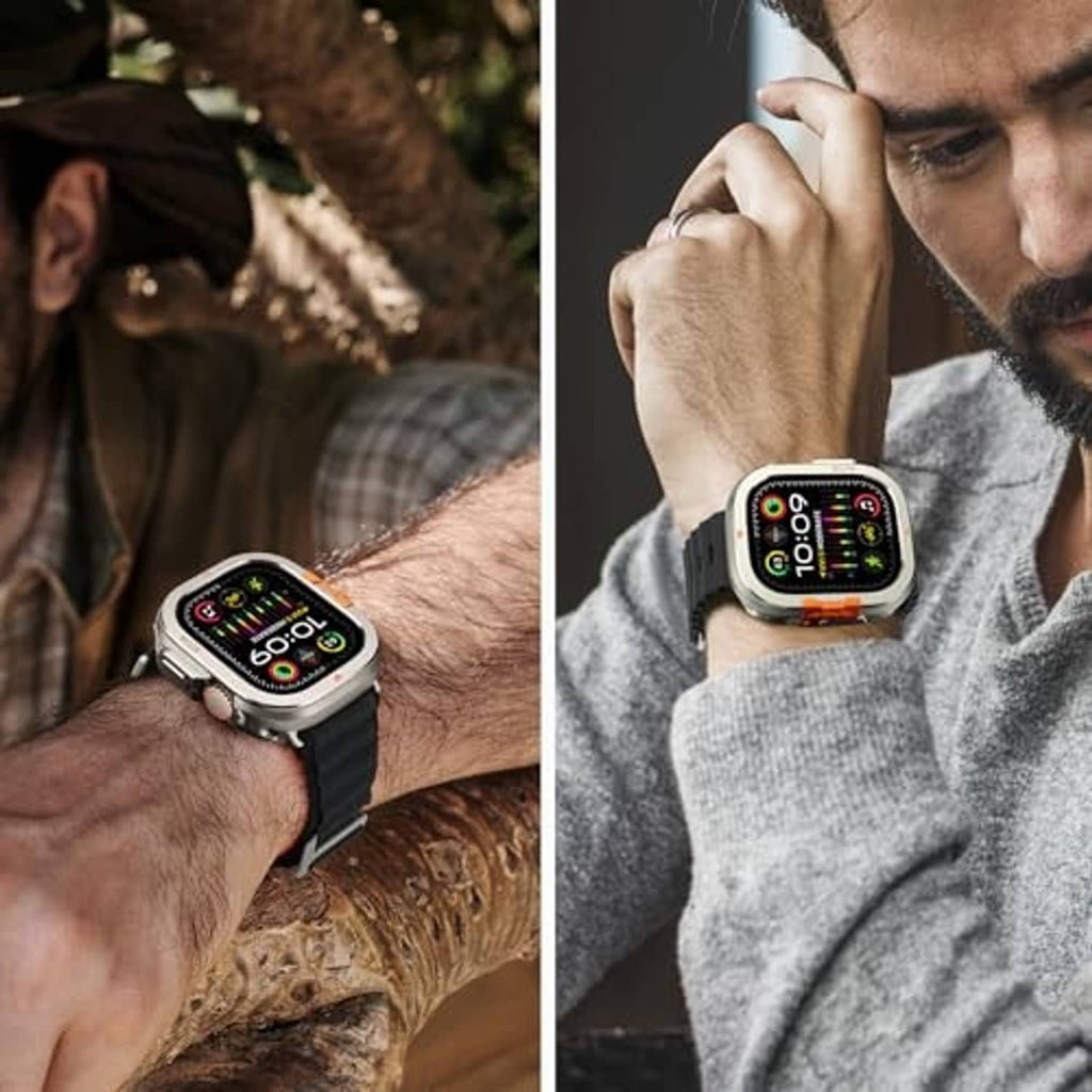 Natural titanium metal watch case on smartwatch with mesh band and orange side buttons