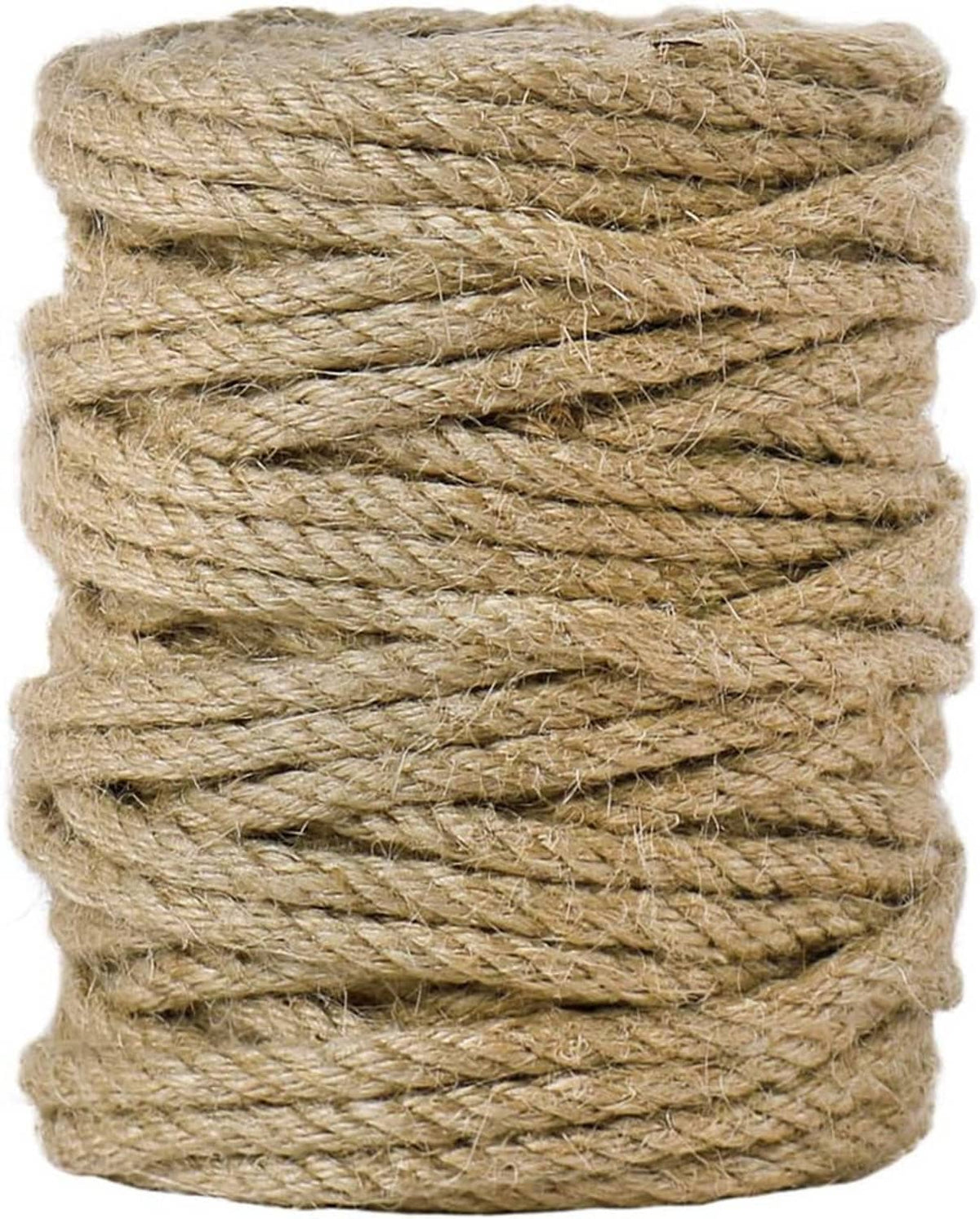 Thick twisted jute rope coil, natural beige-brown, tight wrapped close-up texture.