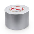 Silver duct tape roll with wide release backing, industrial adhesive tape on spool.