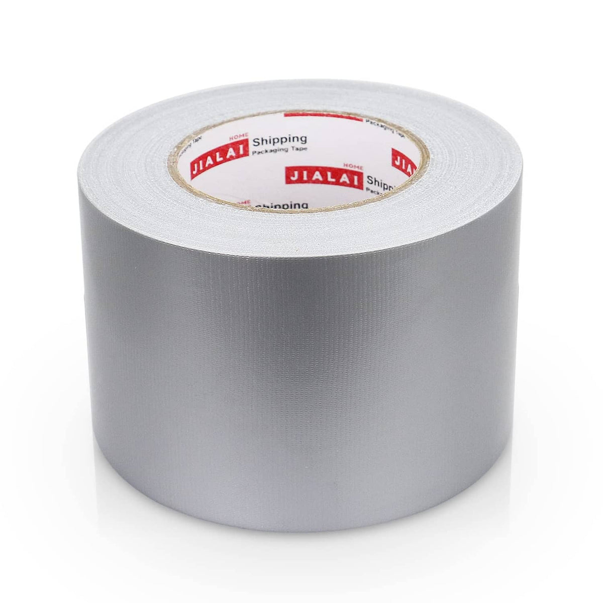 Silver duct tape roll with wide release backing, industrial adhesive tape on spool.