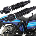 Pair of black rear shock absorbers with coil springs and eyelet mounts