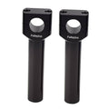 Pair of black handlebar riser clamps with center mounting holes and bolts
