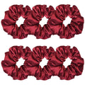 Set of 6 wine red satin scrunchies with gathered ruffle texture