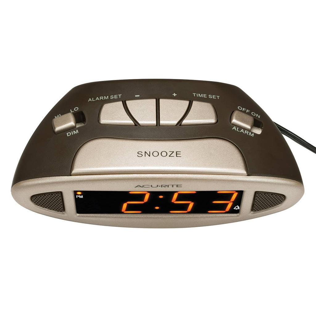Digital alarm clock top control panel with Snooze button and orange LED time display