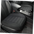 Black front seat bottom cover with stitched panel design and smooth faux leather look