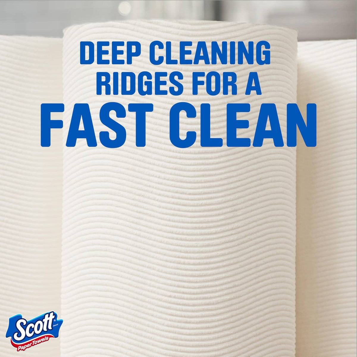 Close-up of white Scott paper towel sheet showing deep cleaning ridges texture.