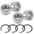 Wheel bearing kit with four metal bearings and four black circlip rings