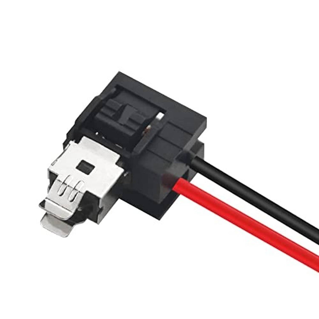 Close-up of headlight wiring adapter connector with red/black wires and H1-style socket
