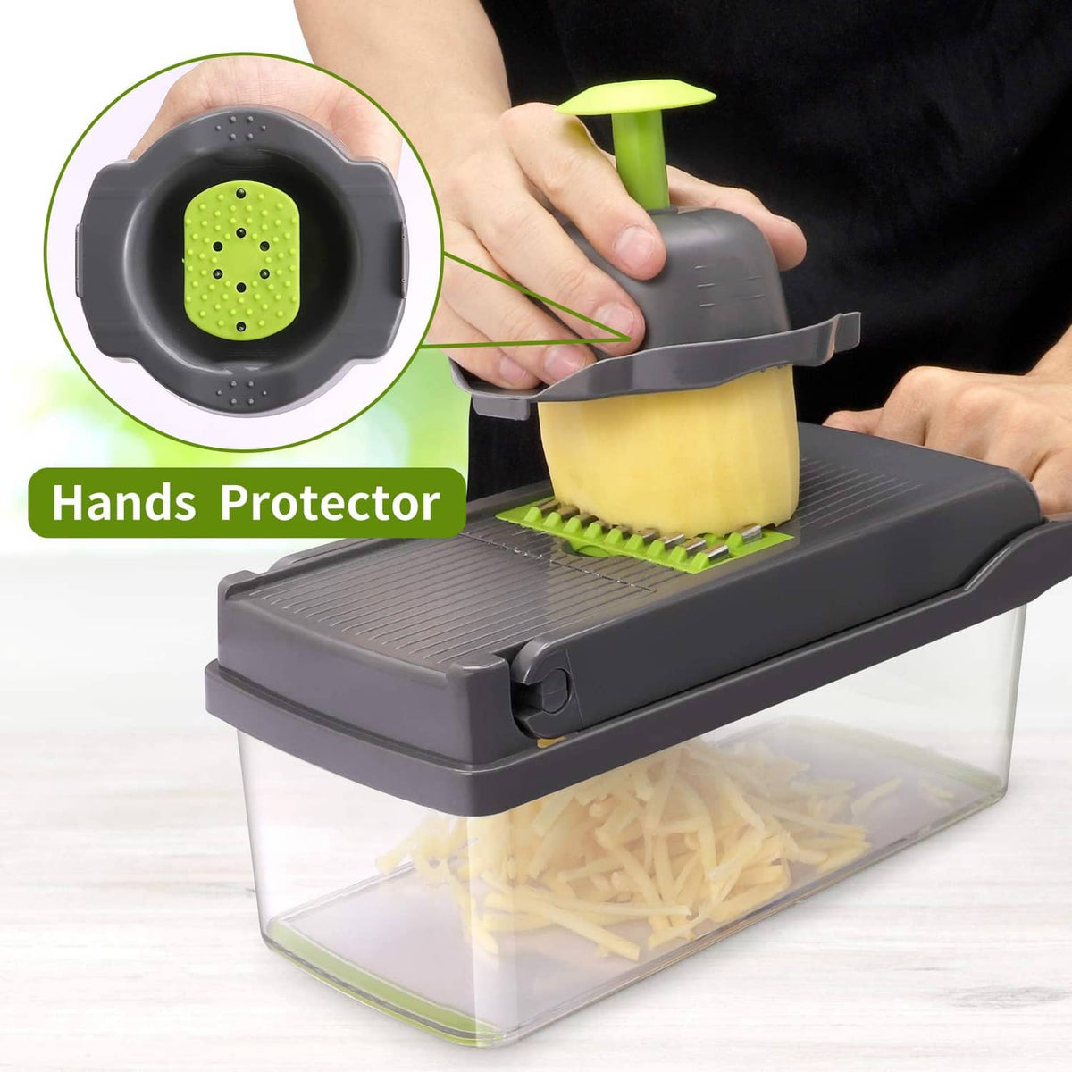 Vegetable chopper with hand protector attachment and green blade insert; grating food in tray