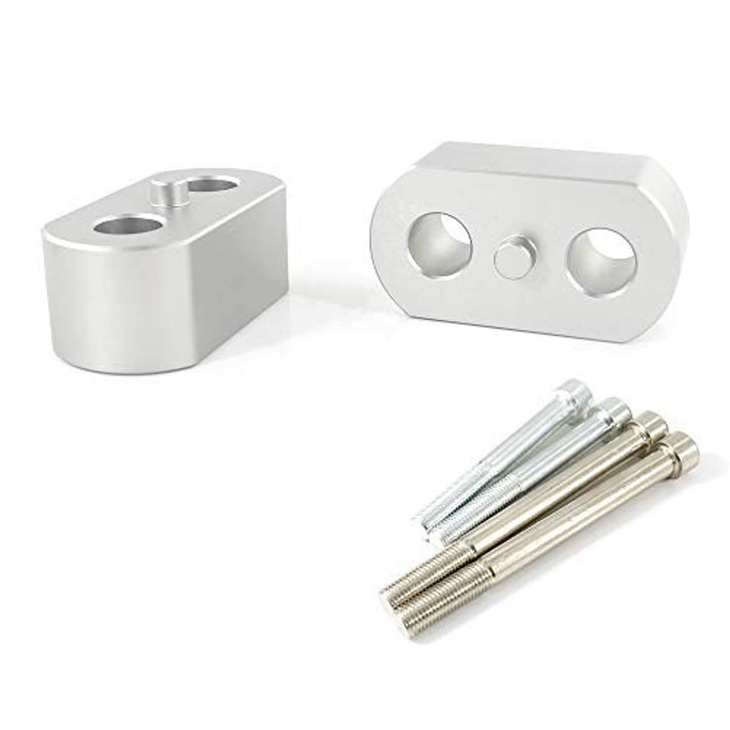 Silver handlebar riser blocks with three circular cutouts and mounting bolts