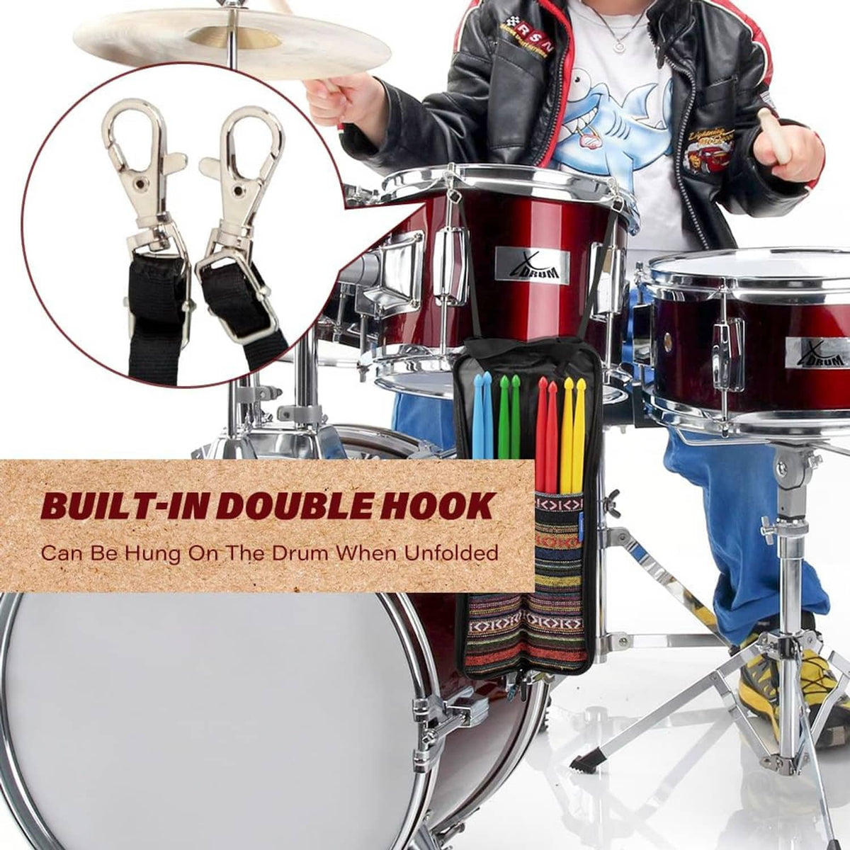 Drum stick bag hanging on drum using built-in double hook clips and black straps.