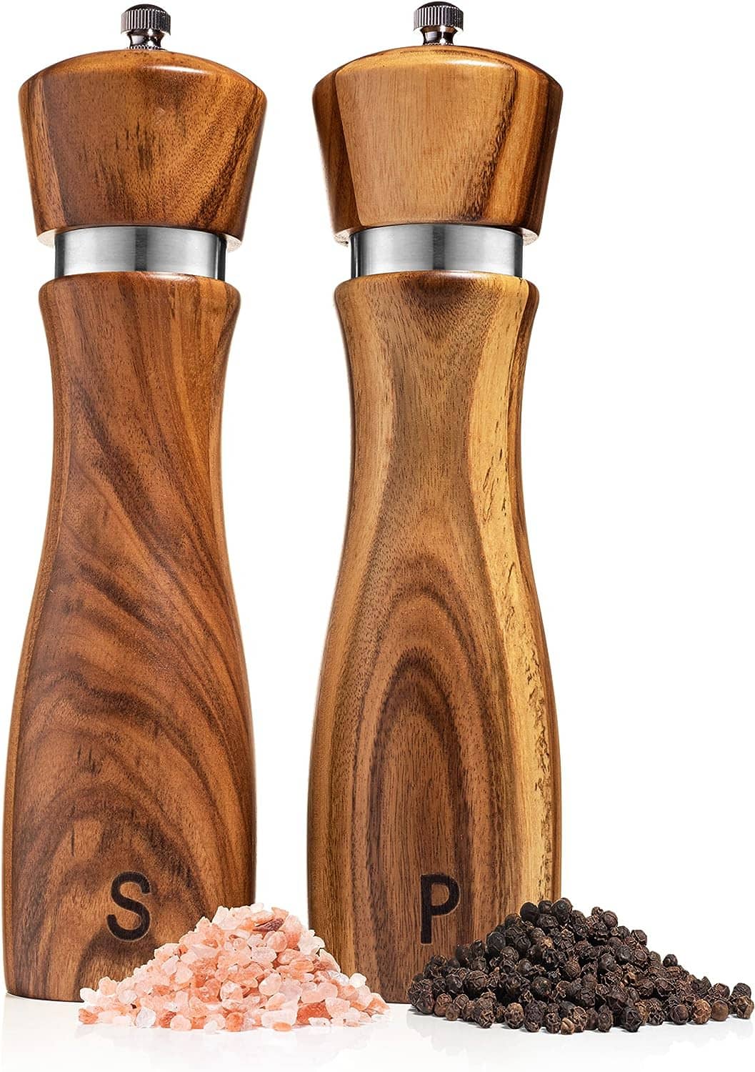 Wooden salt and pepper grinders, upright set with salt and pepper piles