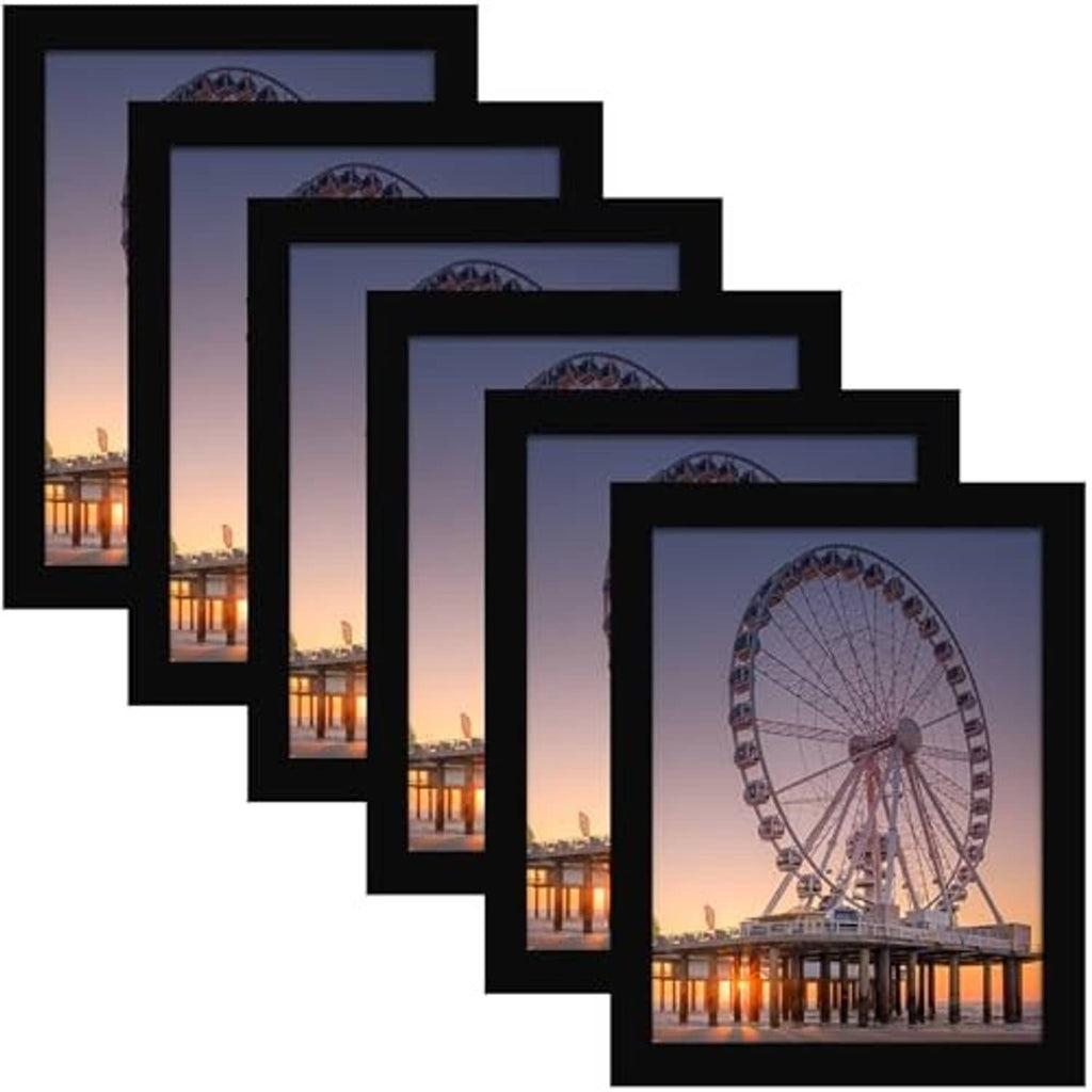 Set of six black photo frames showing city photo prints, glass front