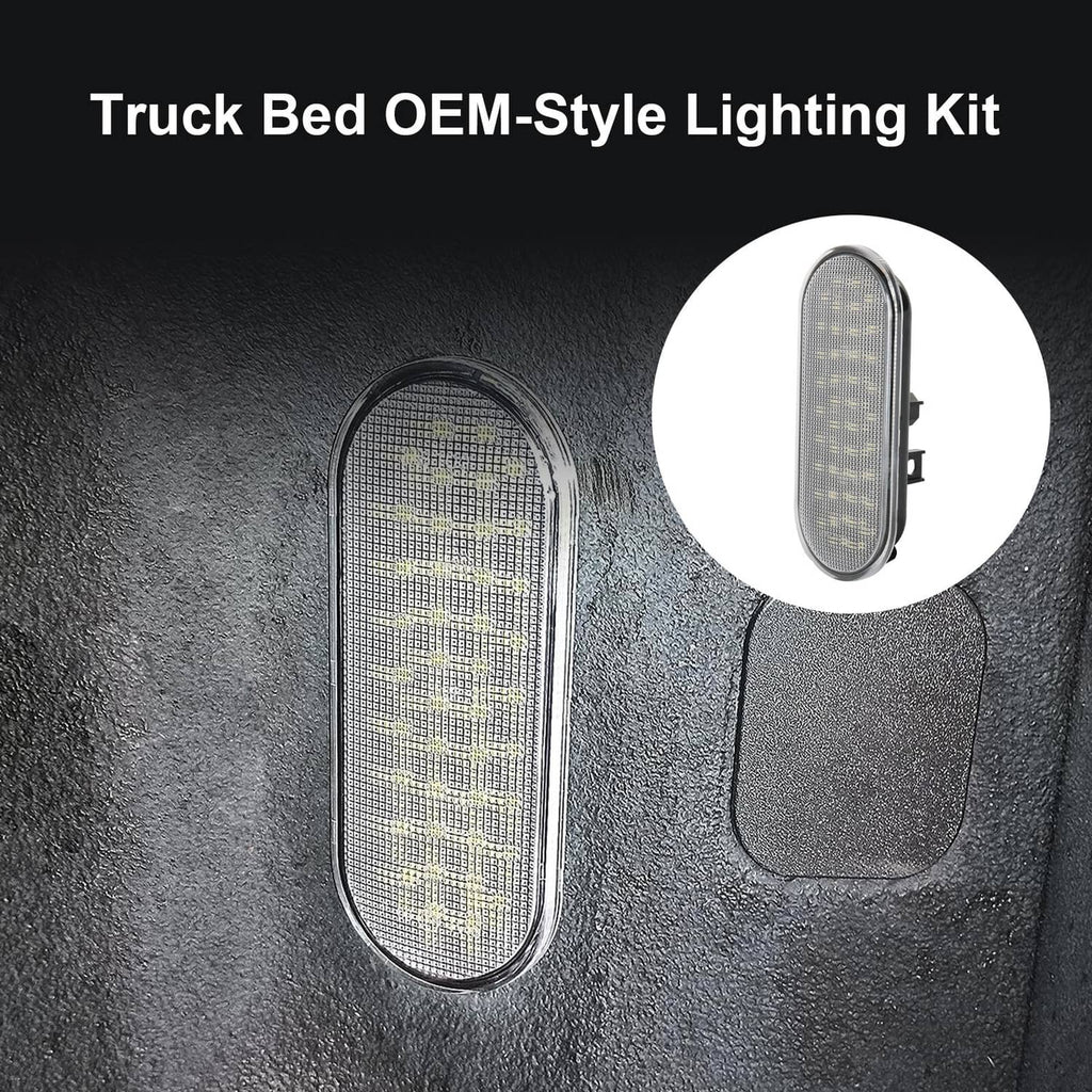Truck bed OEM-style LED light with clear lens and black housing, oval shape and mount tabs